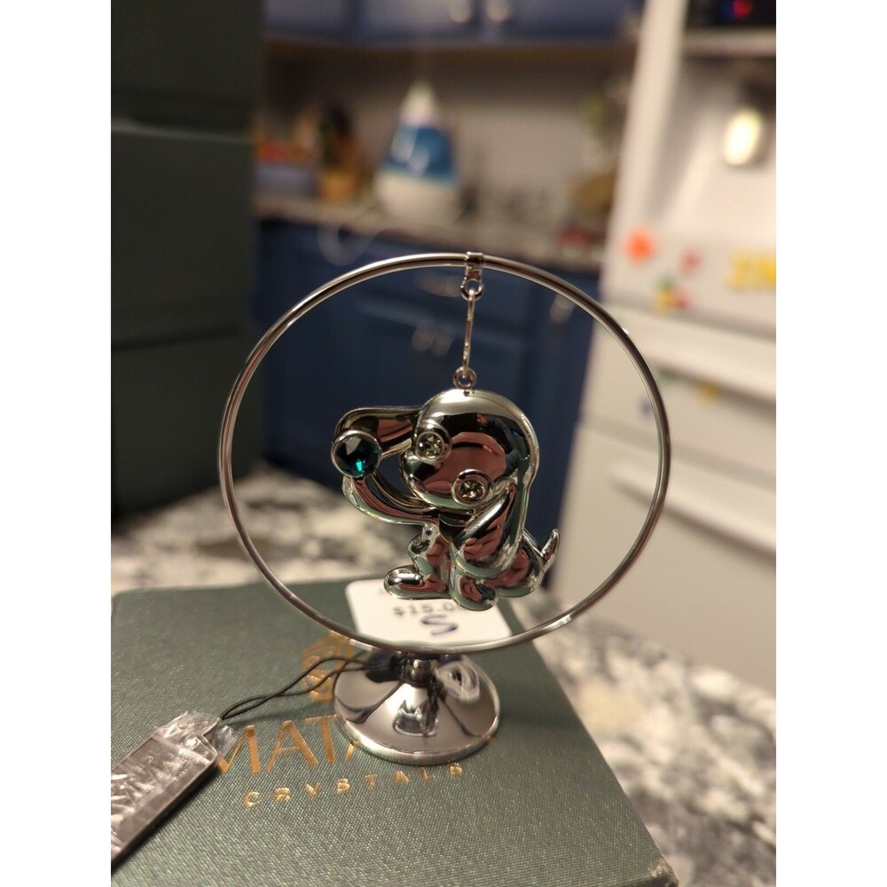 "2021 Year of the Dog" Chrome Plated Silver Puppy Hoop w/ Green Matashi Crystal